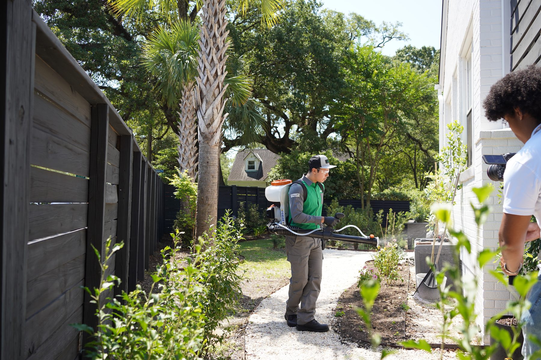 Vinx technician treating yard for ants in Raleigh NC