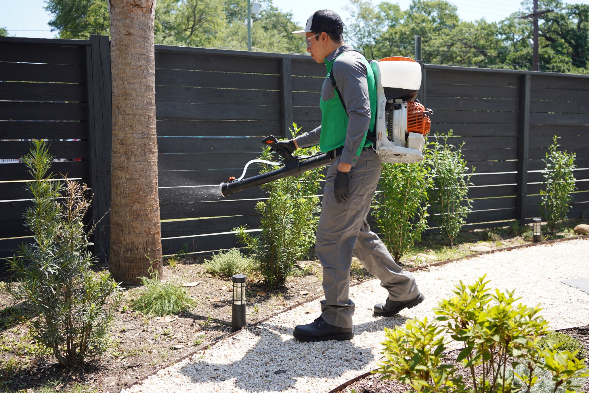 Vinx technician treating yard perimeter up to 30 feet Virginia Beach VA