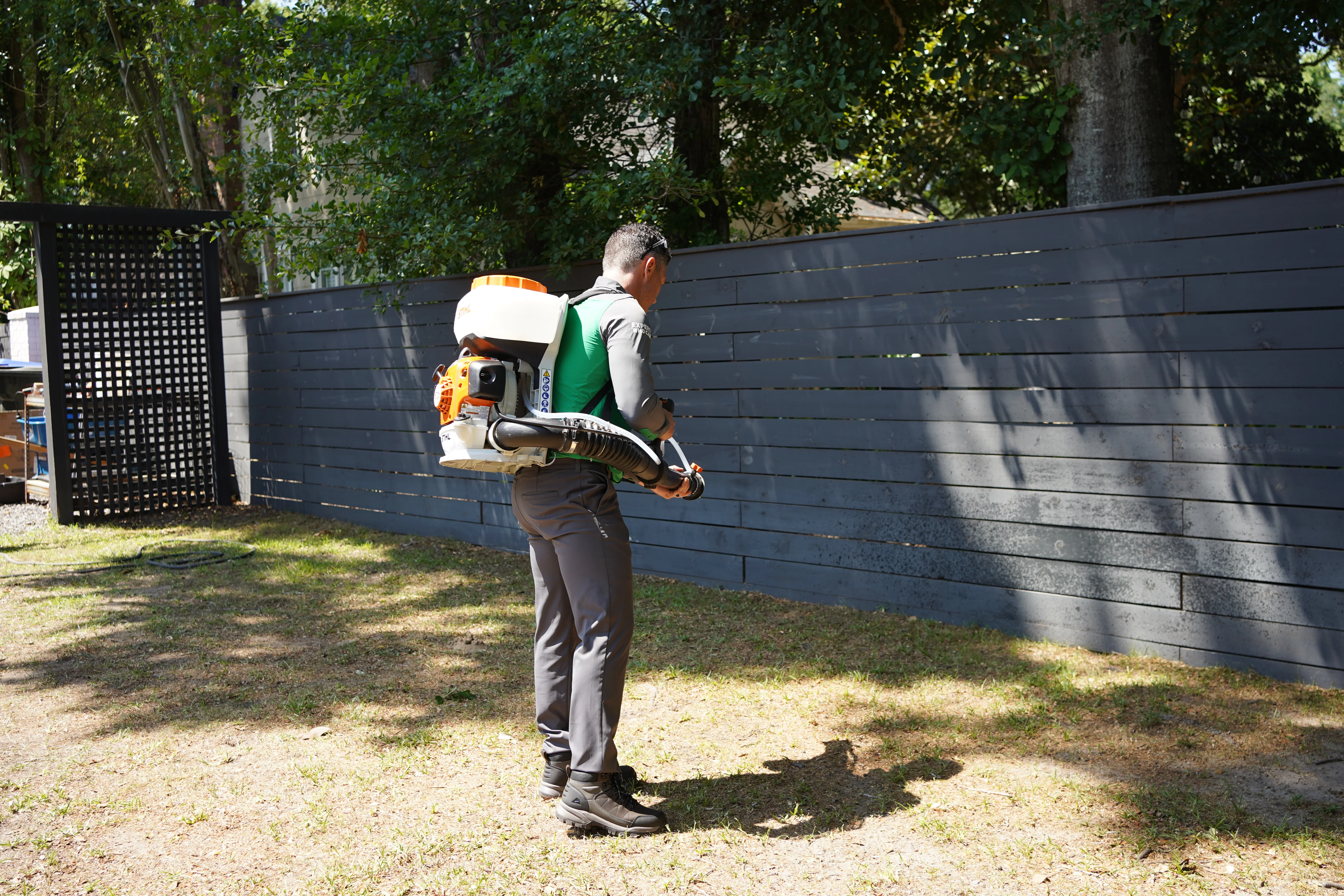 Vinx technician treating yard in Columbia